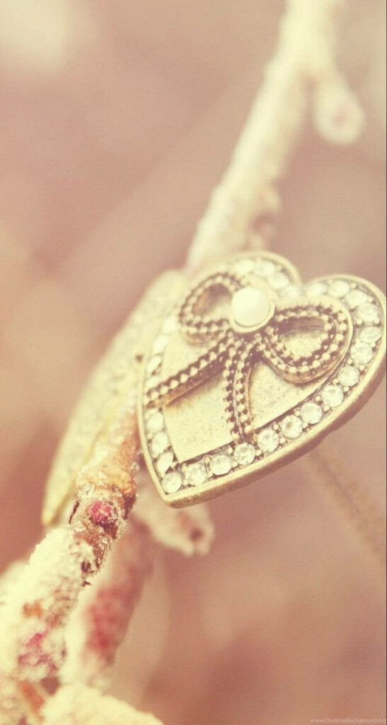 Elegant Beige Heart iPhone Wallpaper with Crystals and Ribbon