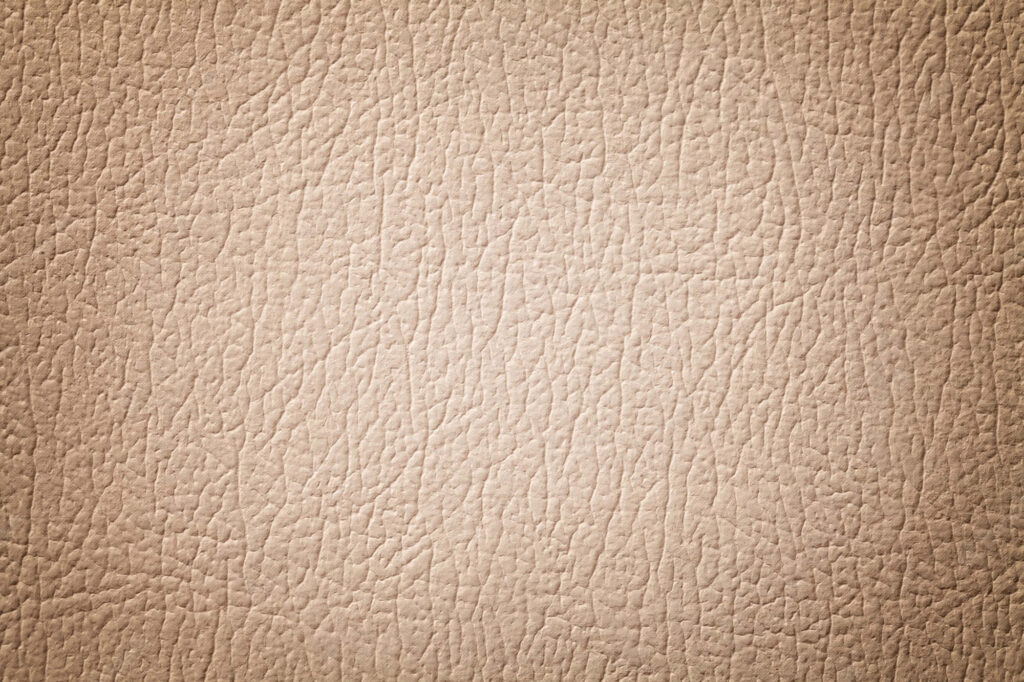 Beige Leather-Textured Wallpaper with Intricate Crease Patterns
