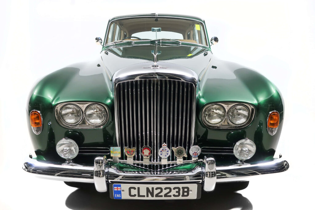 Mountain Majesty: Showcasing the Timeless Elegance of a Classic Bentley S3 Luxury Car Wallpaper