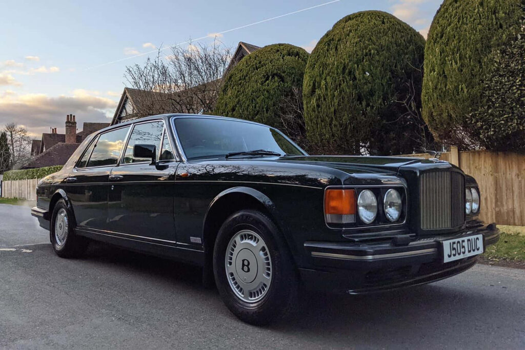 Graceful Power: The Bentley Turbo R Commands Attention in Serene Splendor Wallpaper