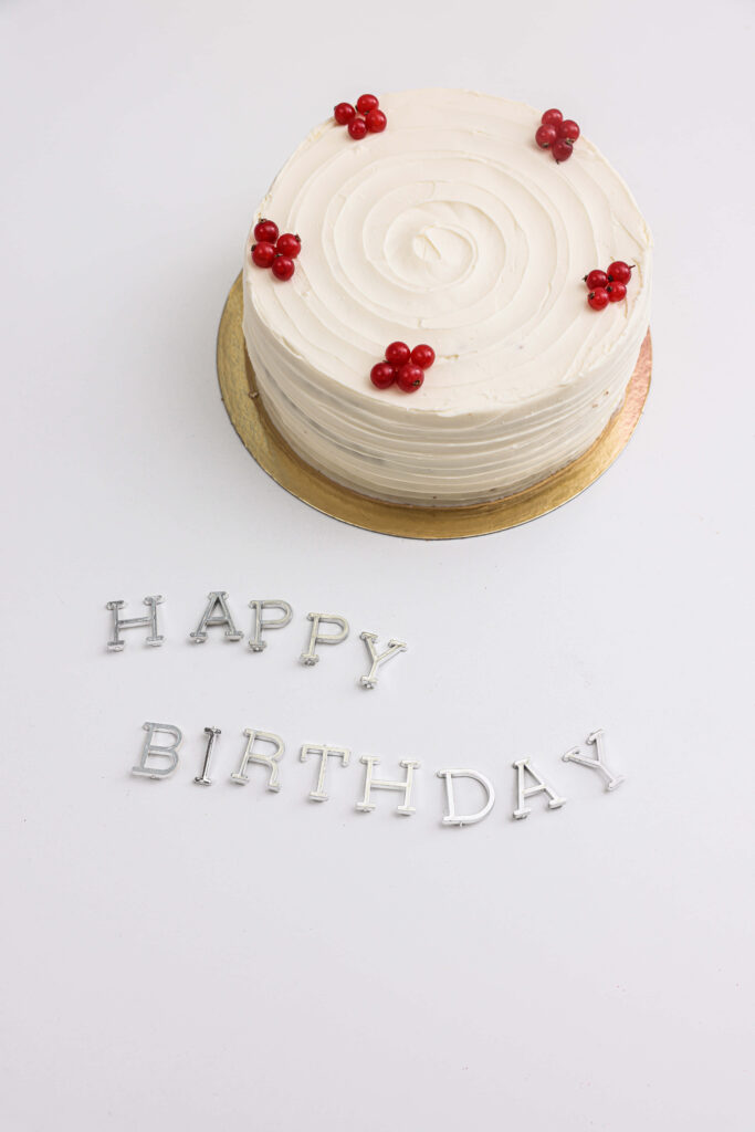 Elegant Frosted Cake Wallpaper with Cherries & Birthday Wishes
