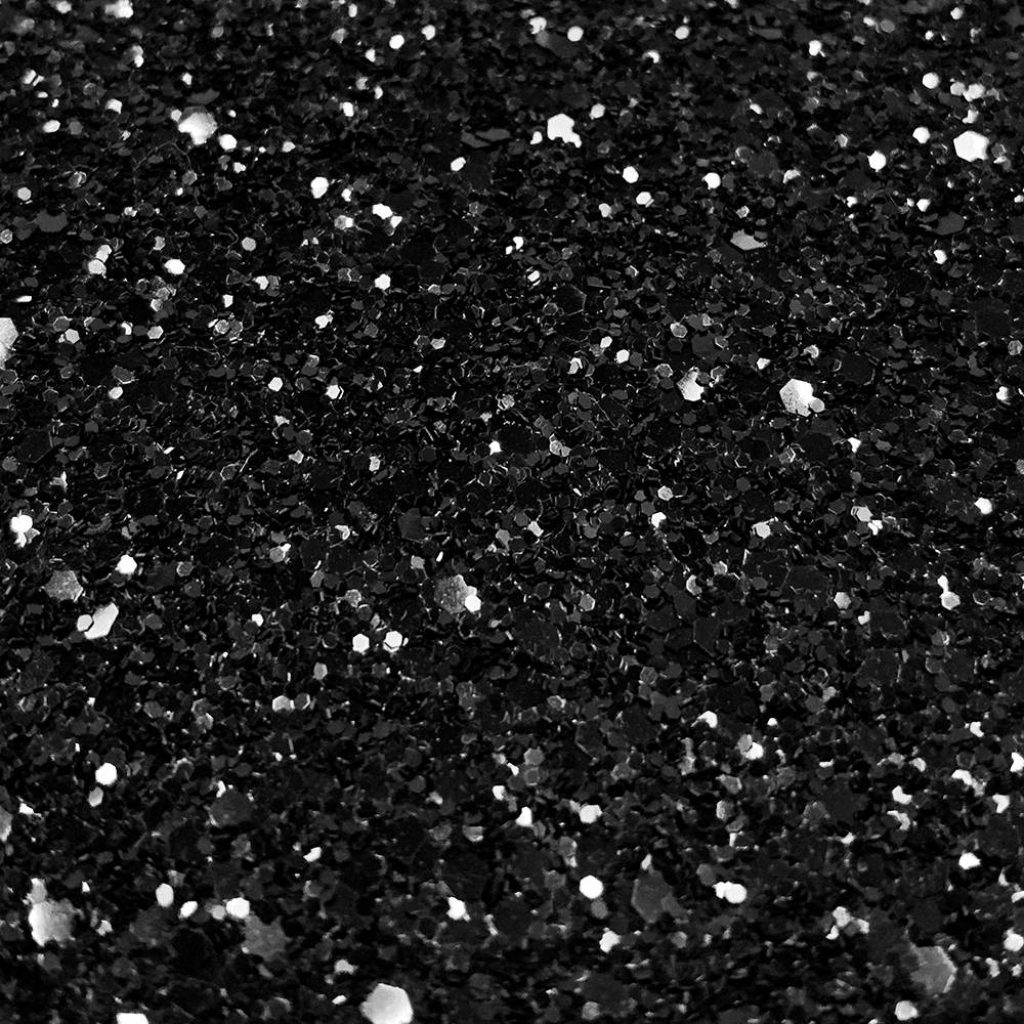 Black glitter wallpaper macro photo textured sparkling silver highlights elegant backdrop