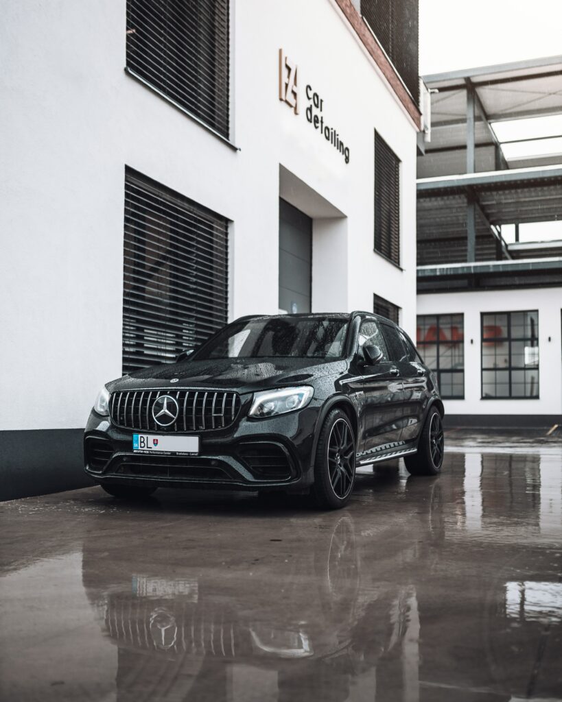 Sleek Black Mercedes Front View Wallpaper - Elegant Car Detailing