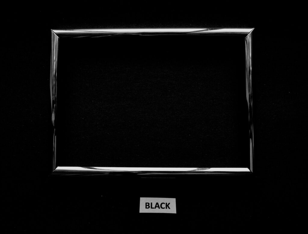 Sleek Silver Frame on Textured Black Wallpaper Background