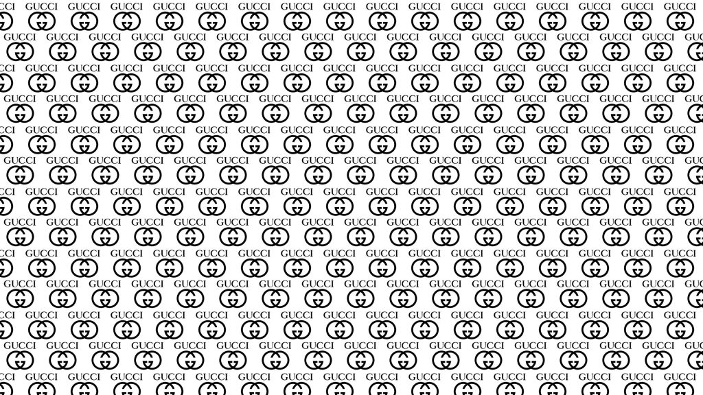 Black and white Gucci wallpaper with iconic GG monogram and luxury brand name pattern background