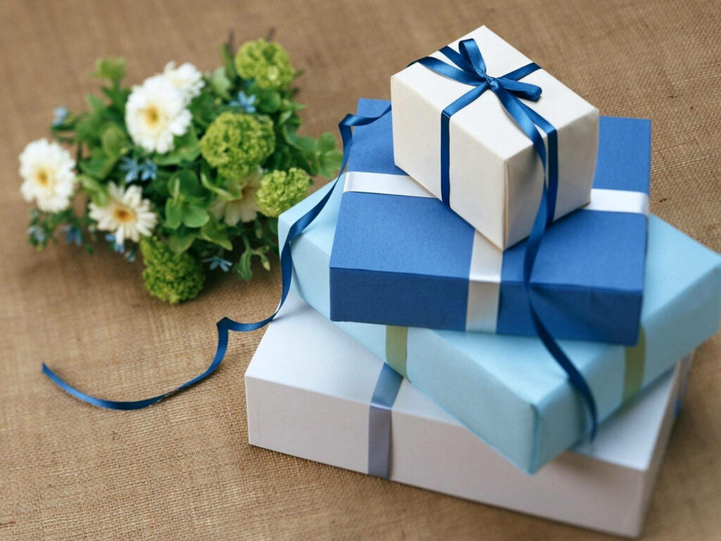 Elegant Blue Gift Boxes on Burlap with Festive Flowers - Wallpaper