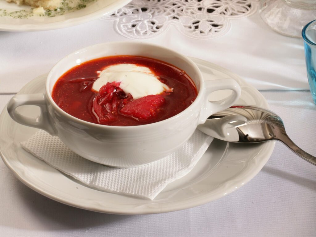 Elegant Borscht Soup with Cream - Stylish Table Setting Wallpaper