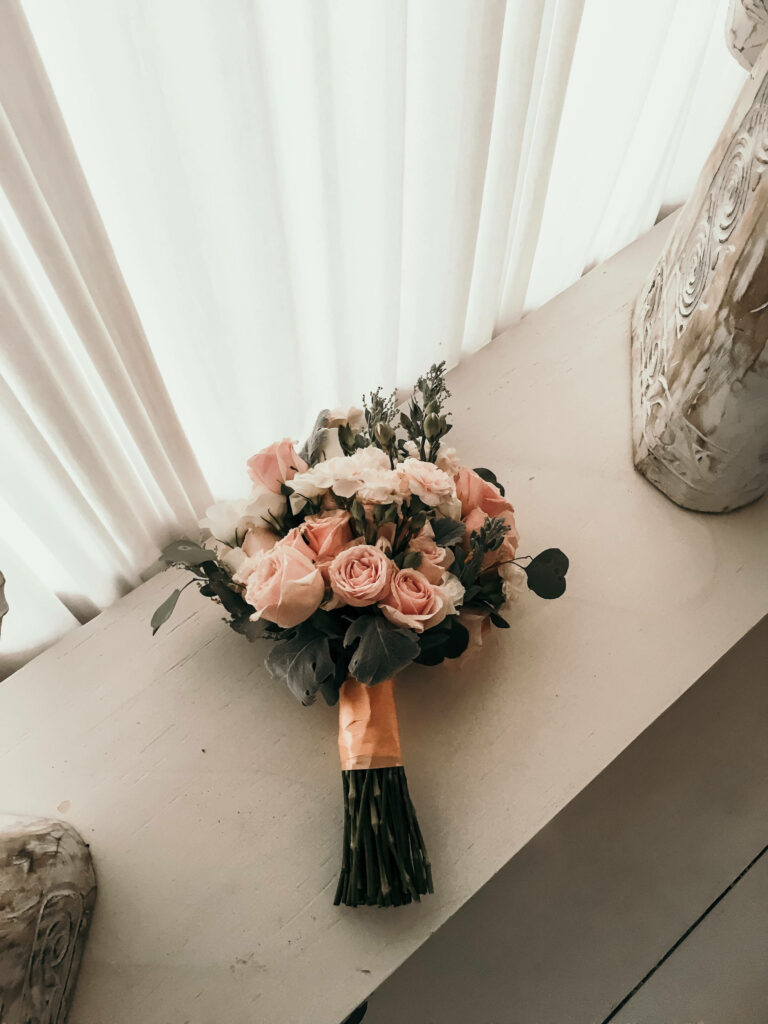 Elegant Bridal Bouquet: White & Pink Roses on Neutral Background Wallpaper