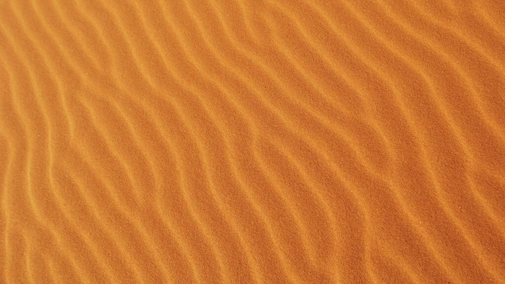 Elegant Brown Sand Wallpaper with Mesmerizing Ripple Patterns