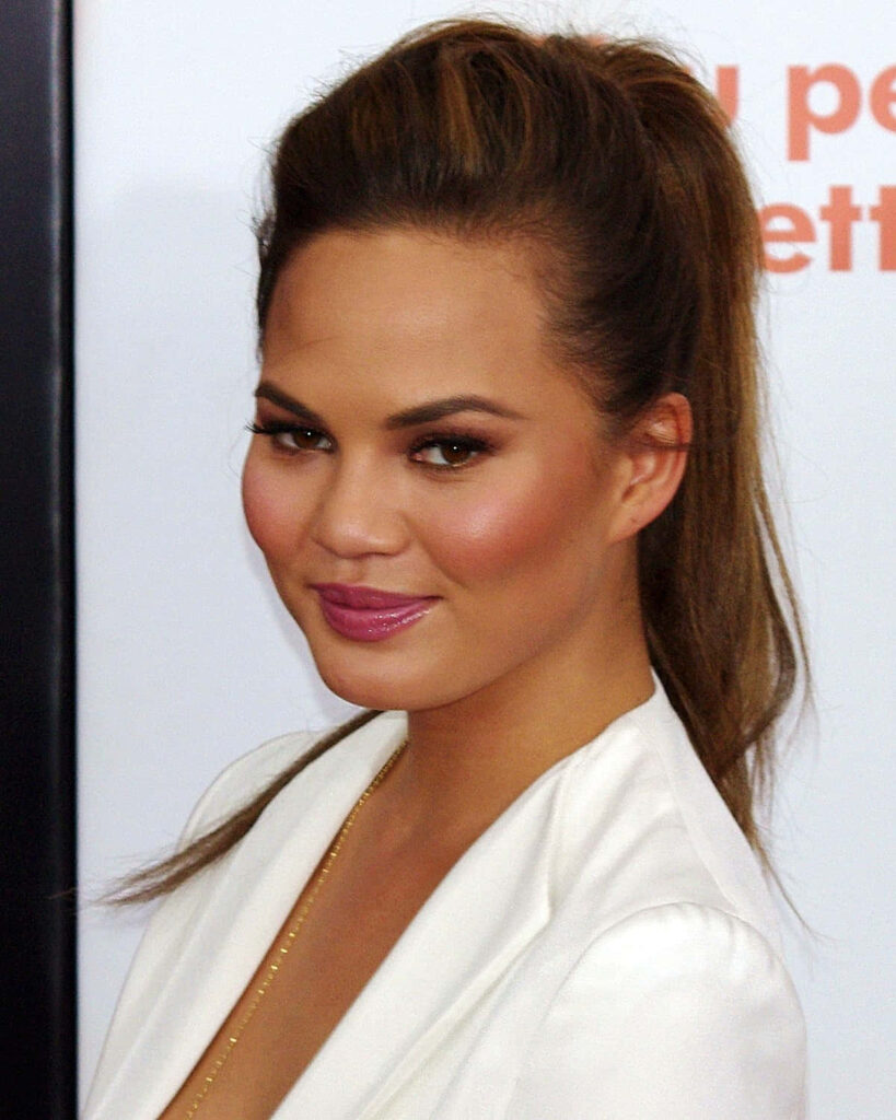 Chrissy Teigen's Elegant Style: Stunning Event Appearance Wallpaper