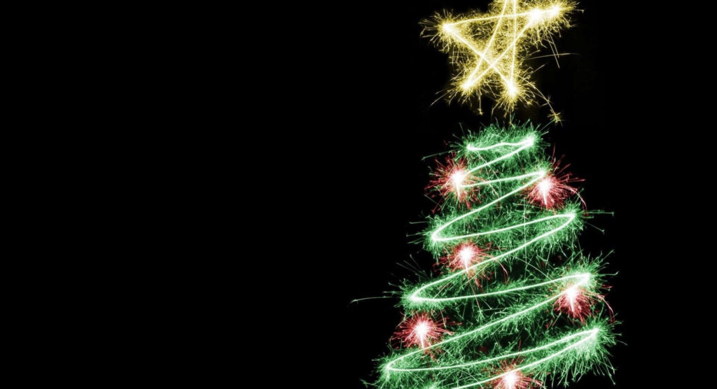 Elegant Christmas Tree Wallpaper: Bright Lights & Starry Night