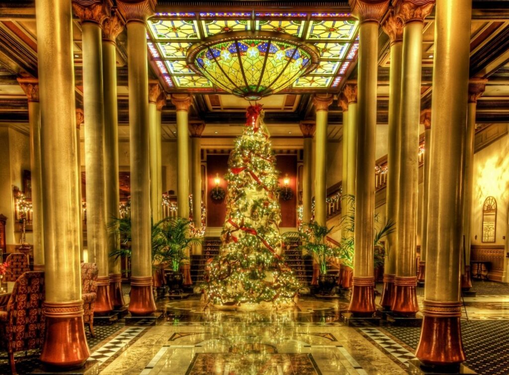 Luxurious Christmas Tree Wallpaper in Elegant Hall with Stained Glass