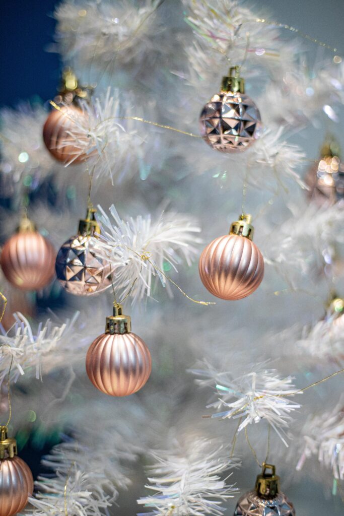 Elegant Christmas Tree Wallpaper with Rose-Gold Baubles
