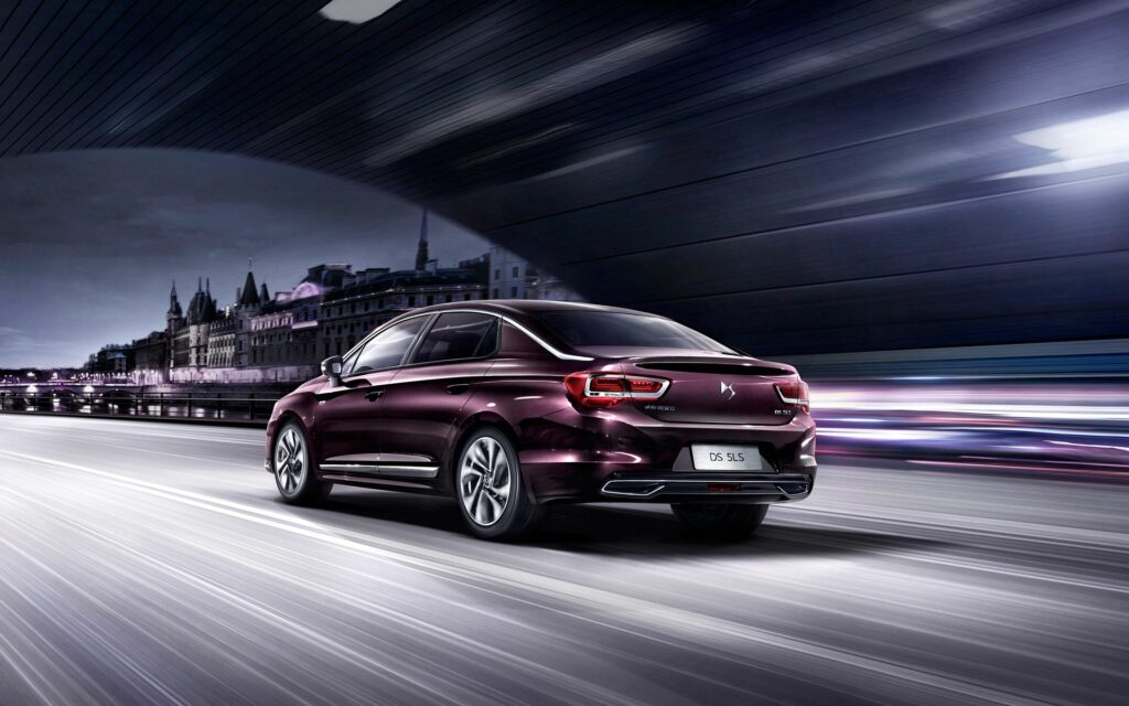 Sleek Citroën DS 5LS in Dynamic Night Scene Wallpaper