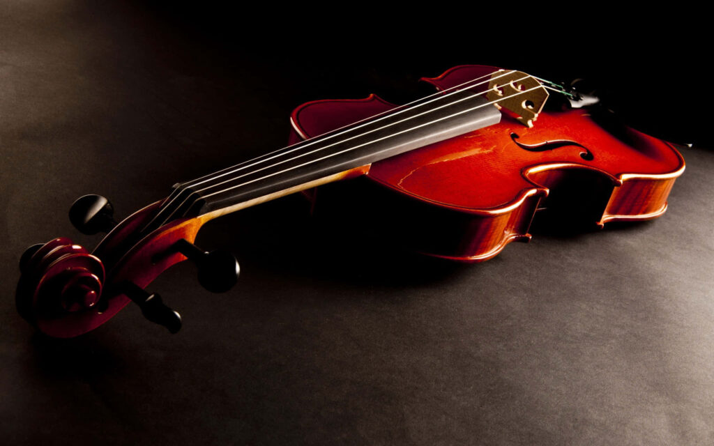 Elegant Classical Violin Wallpaper: Stunning Dark Background Design