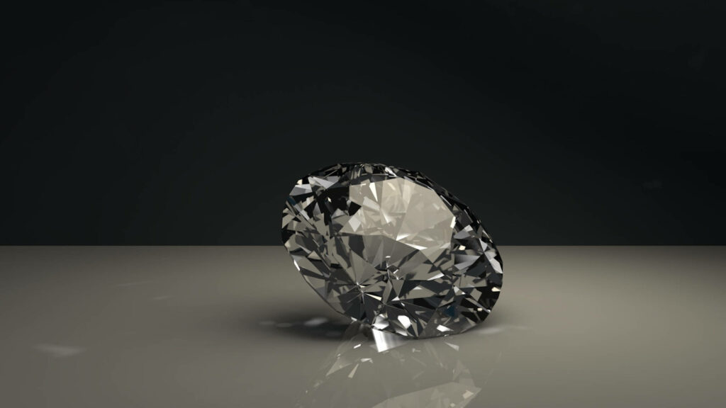 Elegant Transparent Crystal on Sleek Gray Surface - Striking Wallpaper