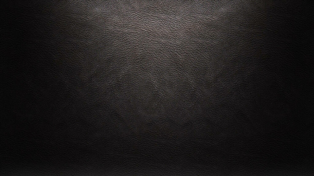 Elegant Dark Leather-Textured Wallpaper with Subtle Lighting Effects