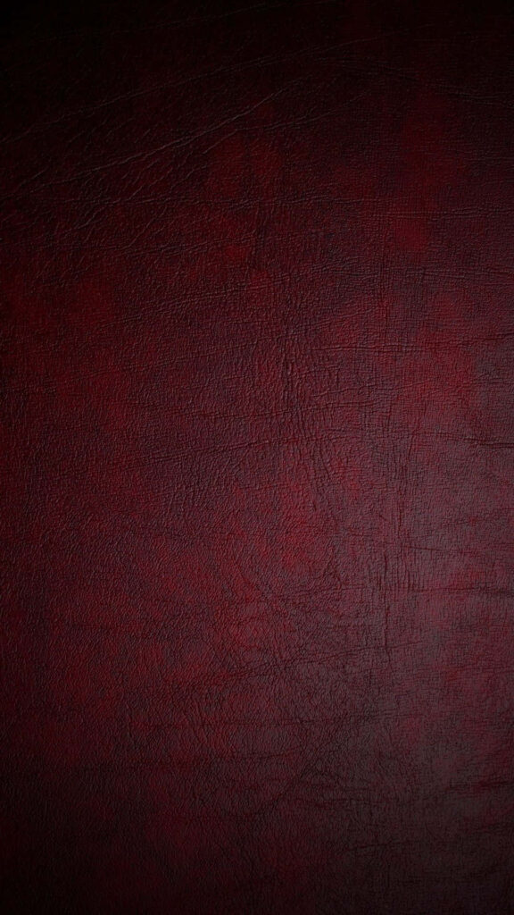 Deep Maroon Leather Texture Wallpaper with Intricate Grain Patterns