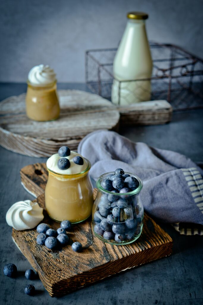 Elegant Dessert Setup with Fresh Blueberries & Fluffy Marshmallows Wallpaper