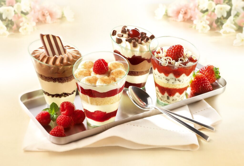 Elegant Dessert Wallpaper with Raspberries & Luxurious Toppings