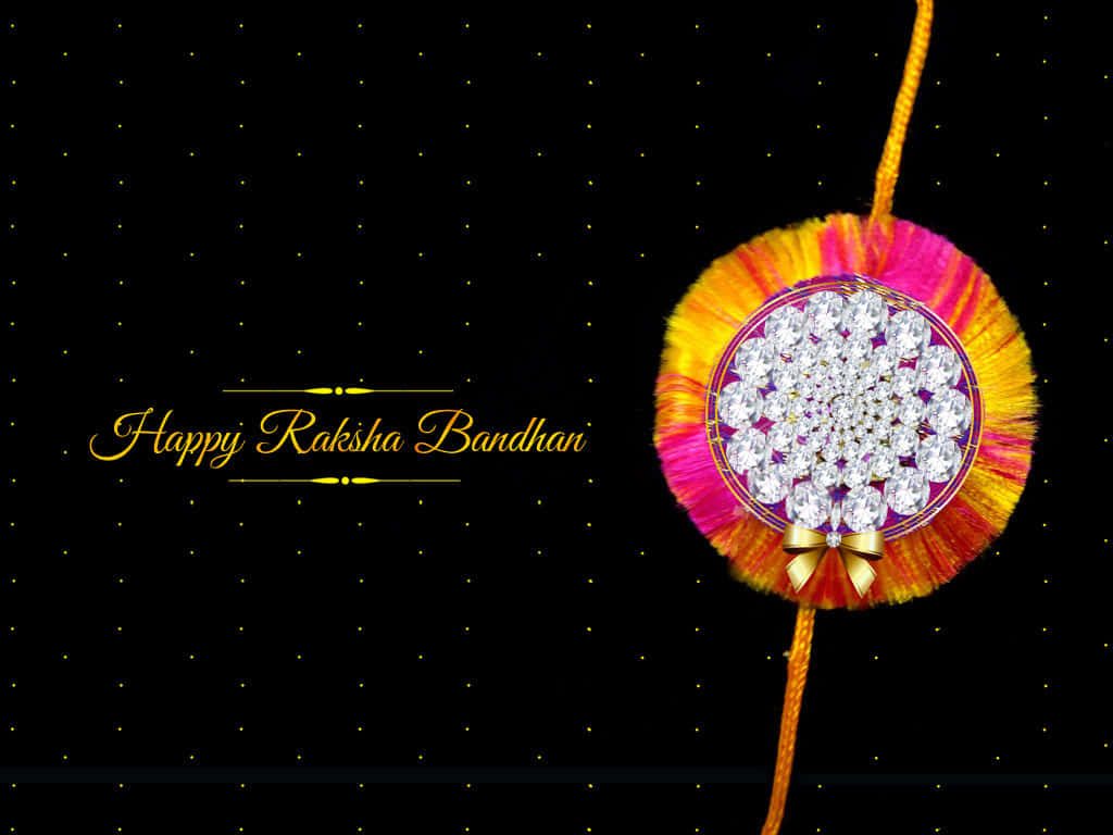Elegant Happy Raksha Bandhan wallpaper with diamond Rakhi yellow pink threads black gold background