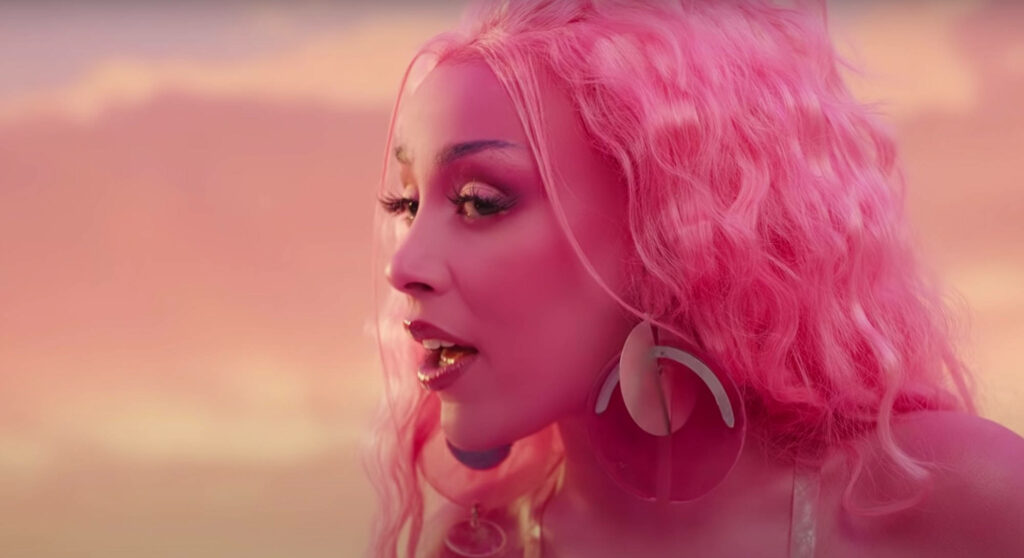 Elegant Doja Cat Wallpaper: Pink Hair & Dreamy Background