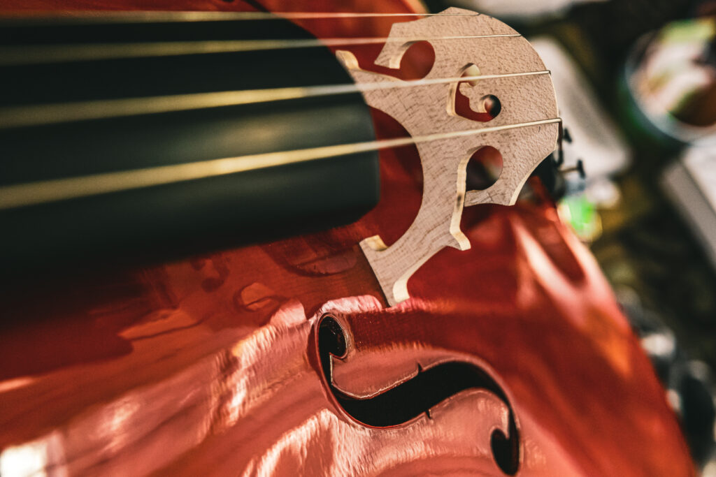 Elegant Double Bass Wallpaper: Polished Wood & Intricate Craftsmanship
