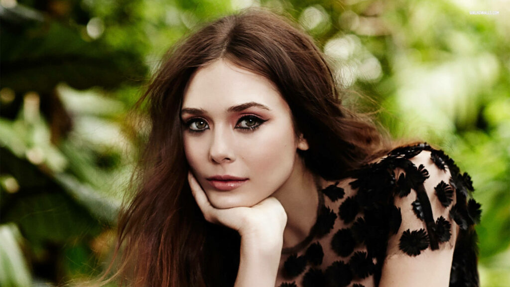 Elegant Elizabeth Olsen in Captivating Floral Wallpaper Background