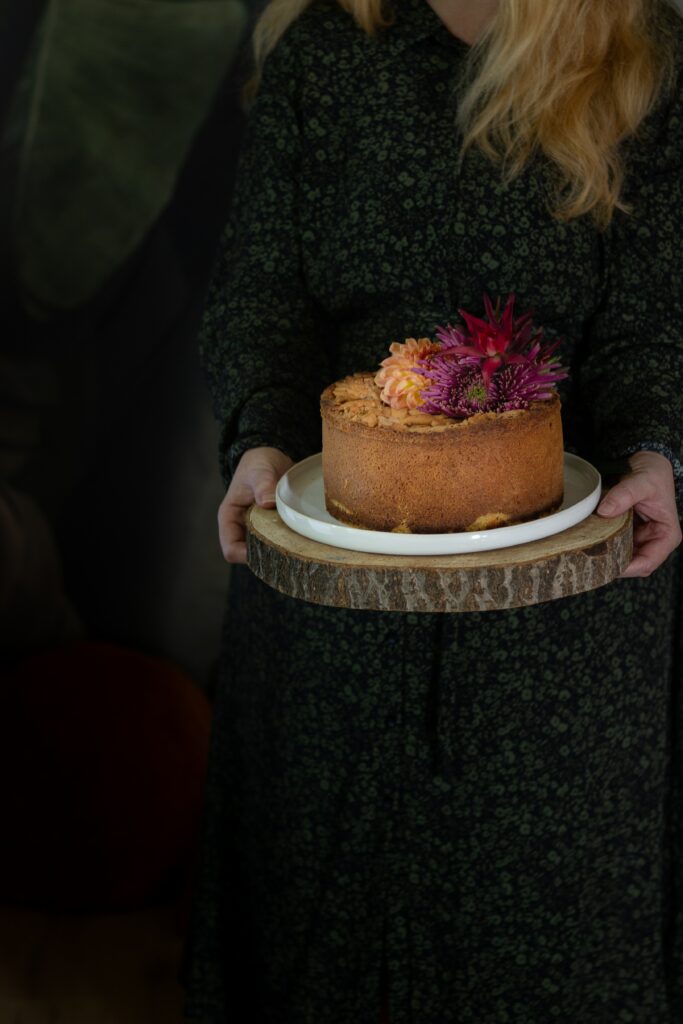 Elegant Cake with Colorful Flowers on Rustic Platter - Wallpaper