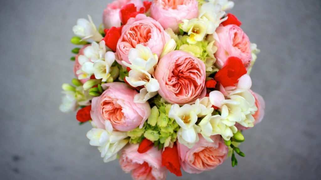 Elegant Bridal Bouquet Wallpaper: Pink Roses & White Freesias Background