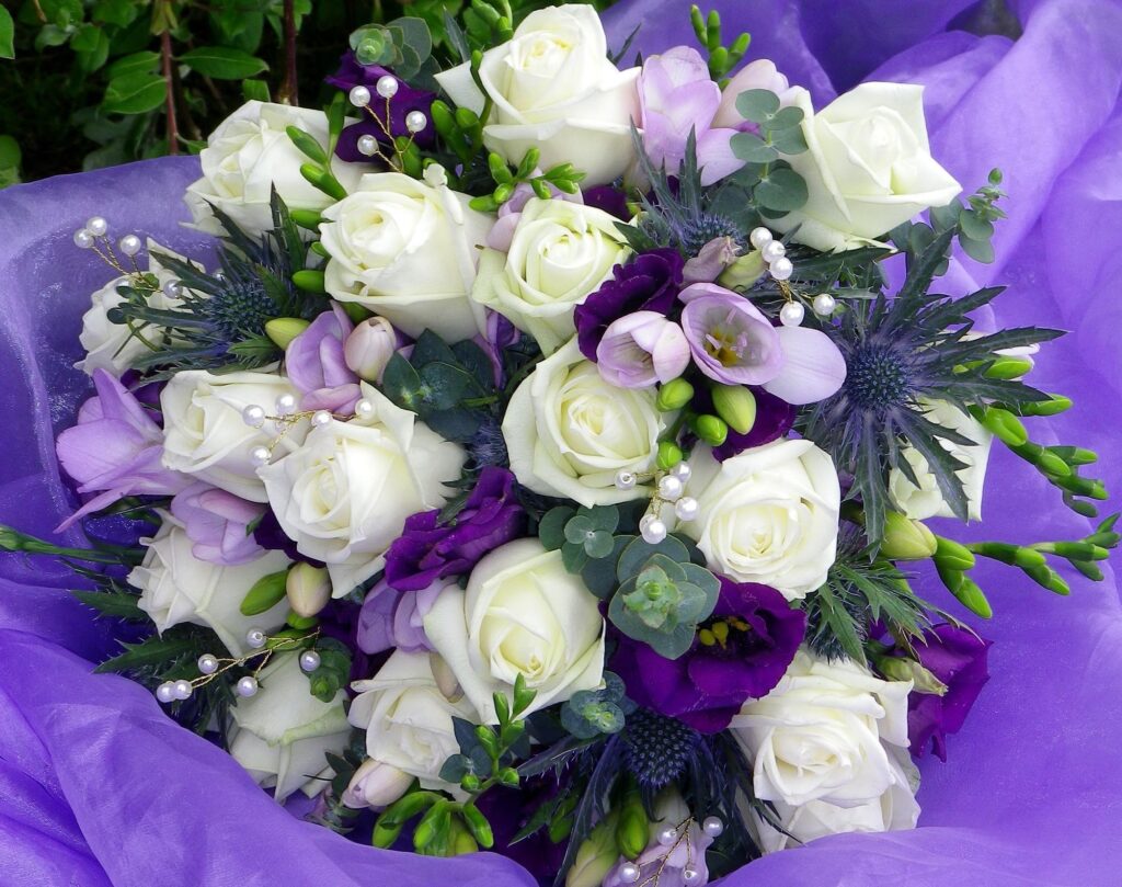 Elegant Floral Wallpaper: White Roses & Purple Lisianthus on Soft Fabric