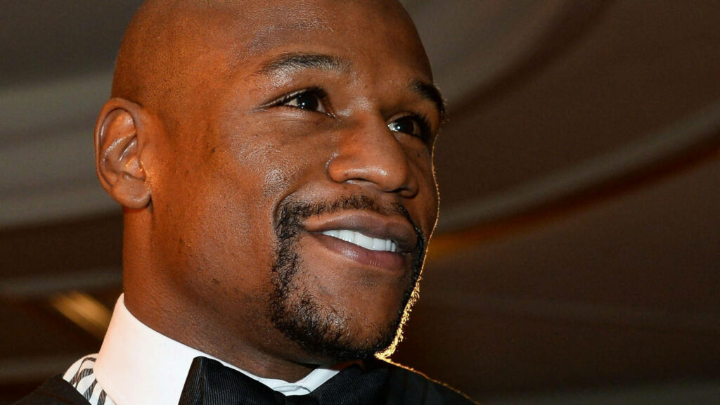 Confident Floyd Mayweather Wallpaper: Elegant Formalwear Close-Up