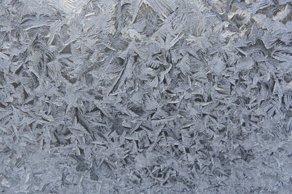 Frosty Glass Texture Wallpaper: Intricate Ice Crystal Patterns
