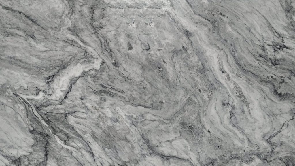 Close-up gray and white marble wallpaper with intricate swirling veins for a modern elegant look