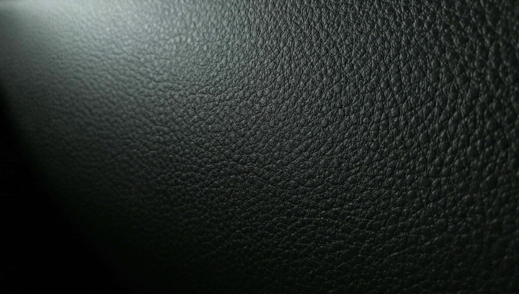 Elegant Green Leather Texture Close-Up - Modern Wallpaper Background