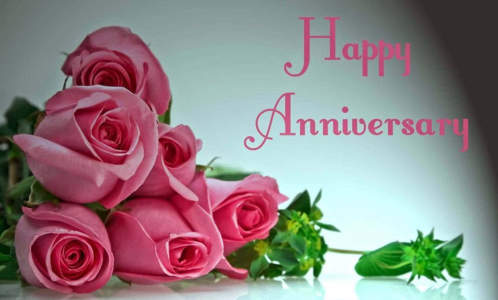 Elegant Happy Anniversary wallpaper with vibrant pink roses and romantic script on light background