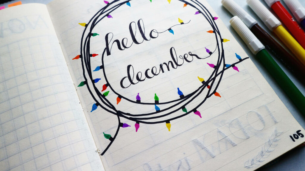 Hello December Wallpaper: Festive Calligraphy & Colorful Lights