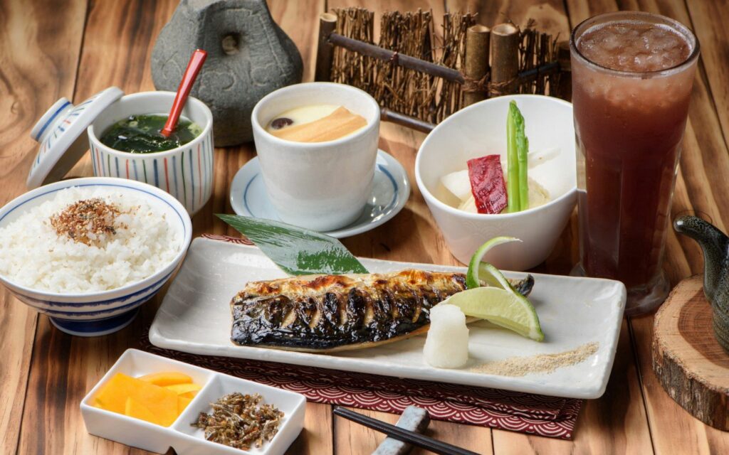 Elegant Japanese Meal Wallpaper: Grilled Fish, Rice & Vegetables