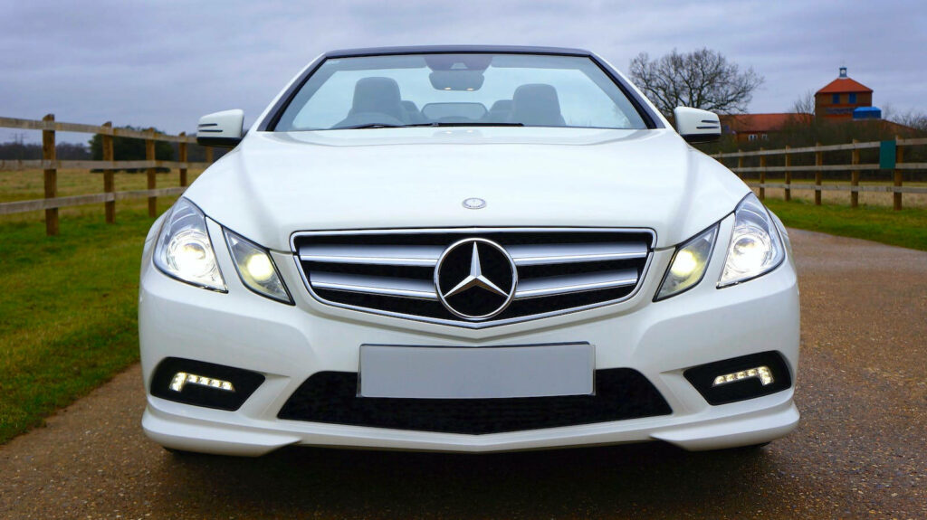 Sleek Mercedes-Benz E-Class Wallpaper in Serene Countryside