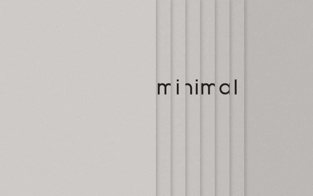 Minimalist Wallpaper: Elegant Black 'Minimal' on White Background