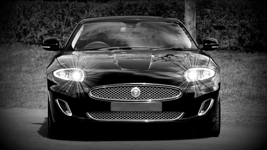 Elegant Jaguar Car Monochrome Wallpaper: Sleek Design & Dramatic Effect