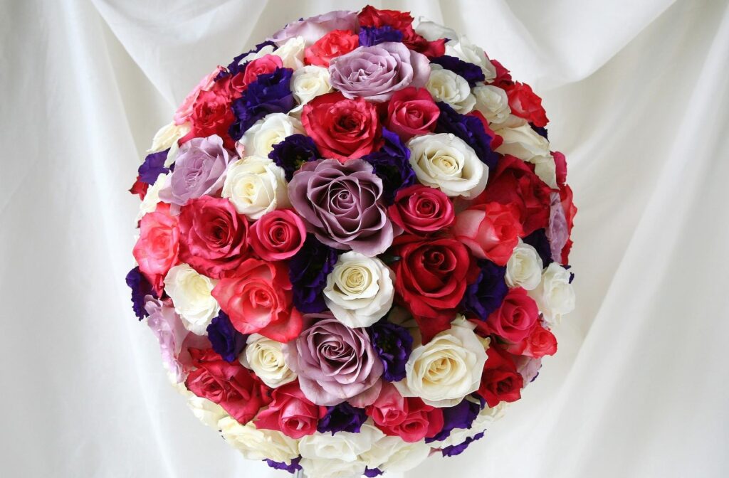 Elegant Multicolored Rose & Lisianthus Bouquet Wallpaper Background