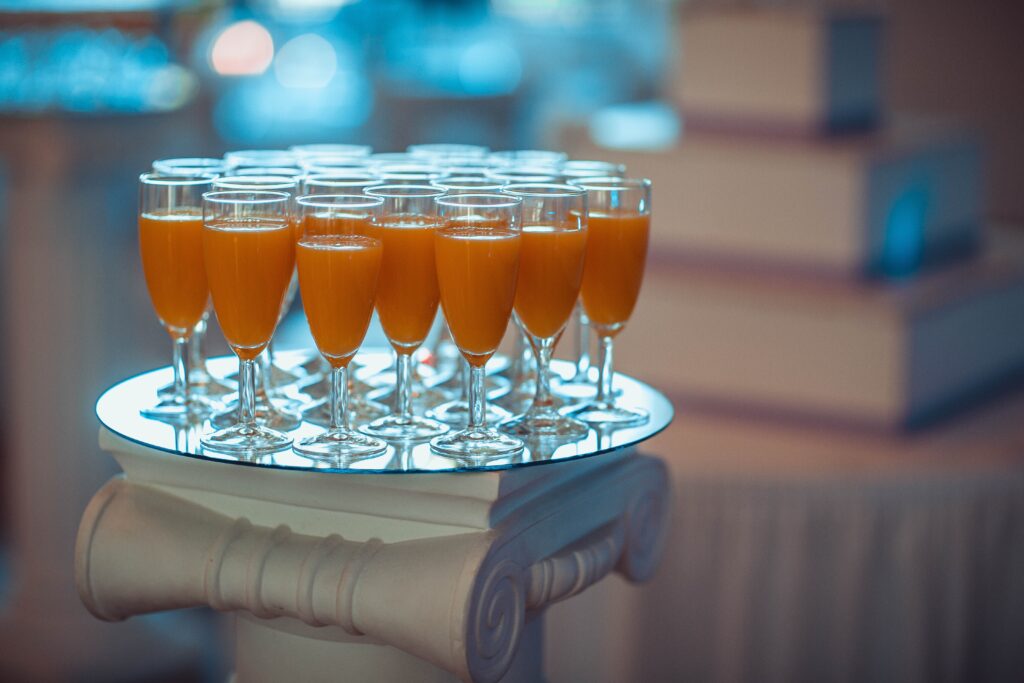 Elegant Orange Juice Tray Wallpaper - Refreshing Ambiance Background