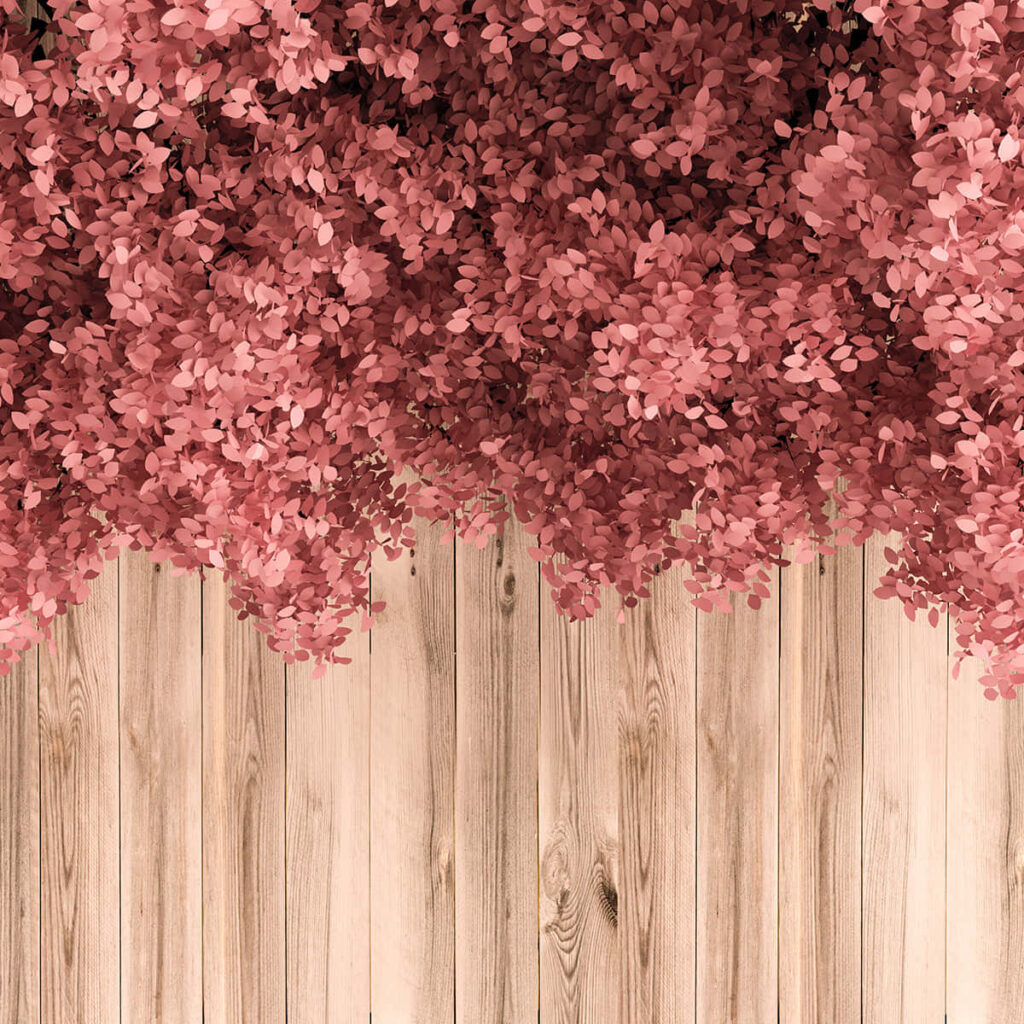 Elegant Pink Flower Cascade on Rustic Wood Background Wallpaper