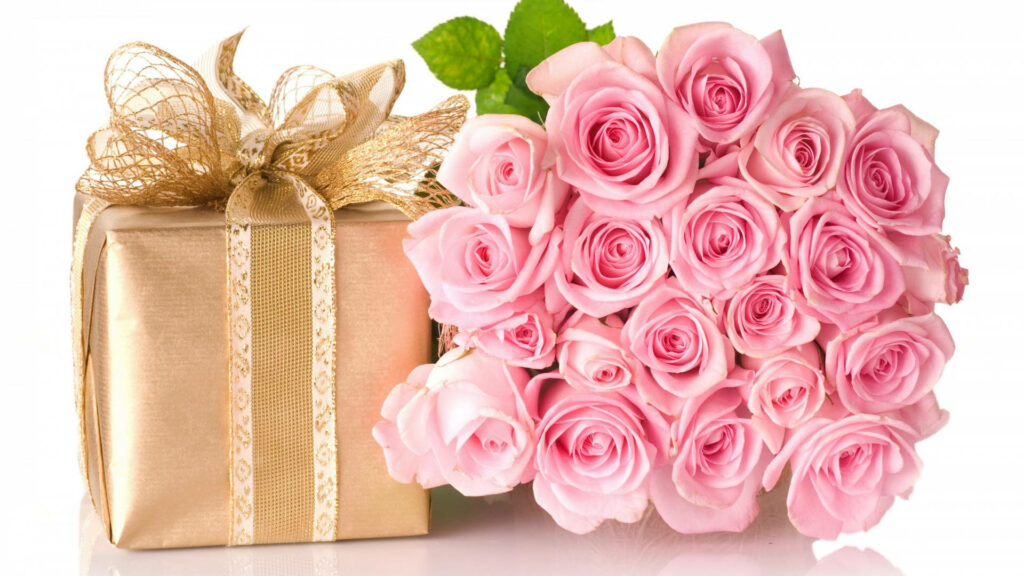 Elegant Pink Rose Bouquet and Gold Gift for Birthday Celebration Wallpaper