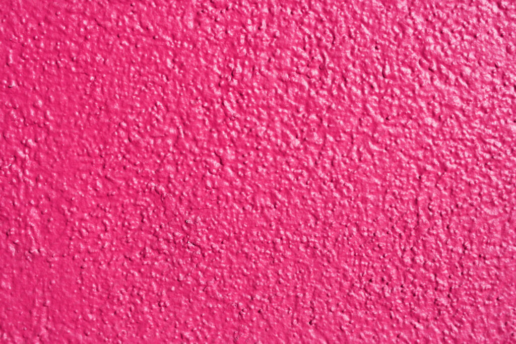 Vibrant Pink Textured Wallpaper: Elegant Close-Up Rugged Surface