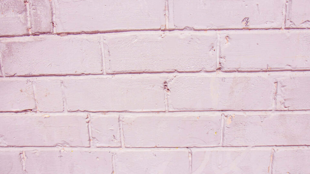 Elegant Pink Textured Wallpaper: Soft Painted Brick Wall Design
