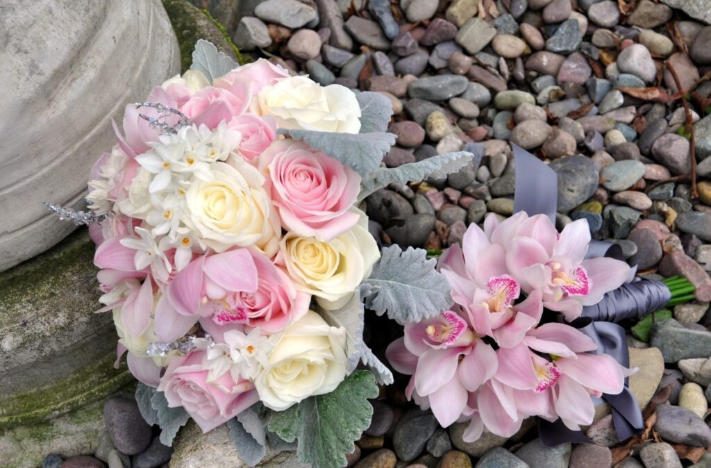 Elegant Pink & White Roses Wallpaper with Earthy Pebble Background