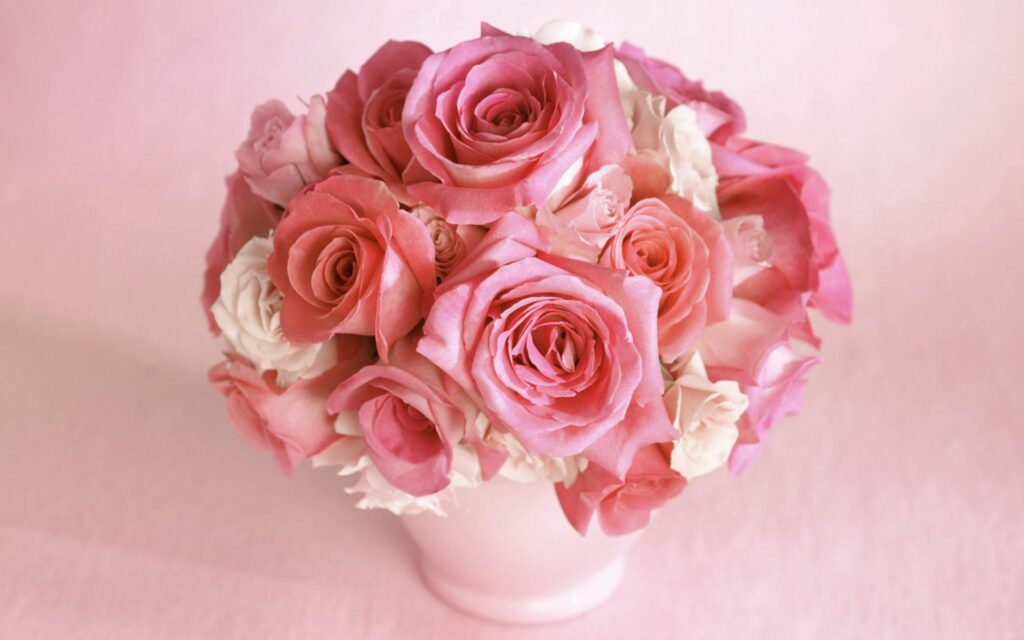 Elegant Pink and White Rose Bouquet Wallpaper on Soft Pink Background
