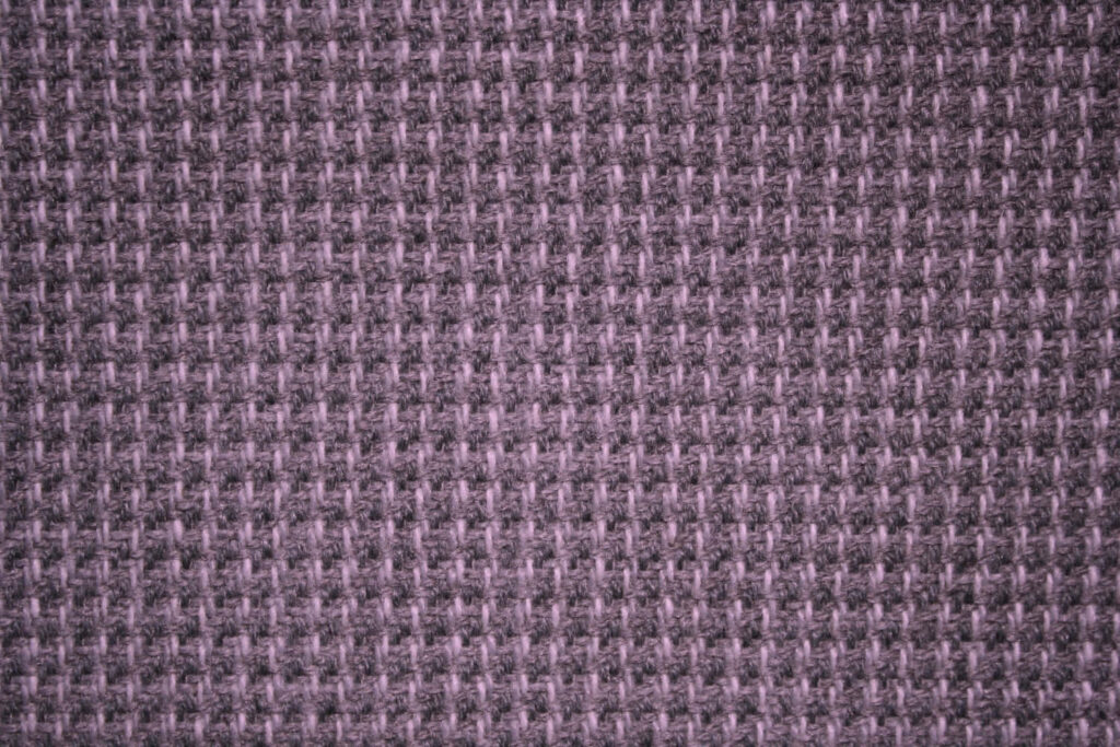 Intricate Purple Fabric Texture Wallpaper Background - Stylish Design